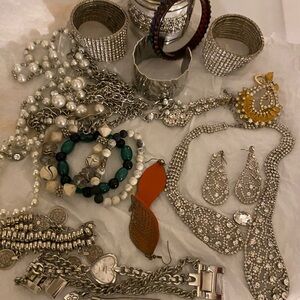 Silver and Gold Bracelets with Intricate Designs